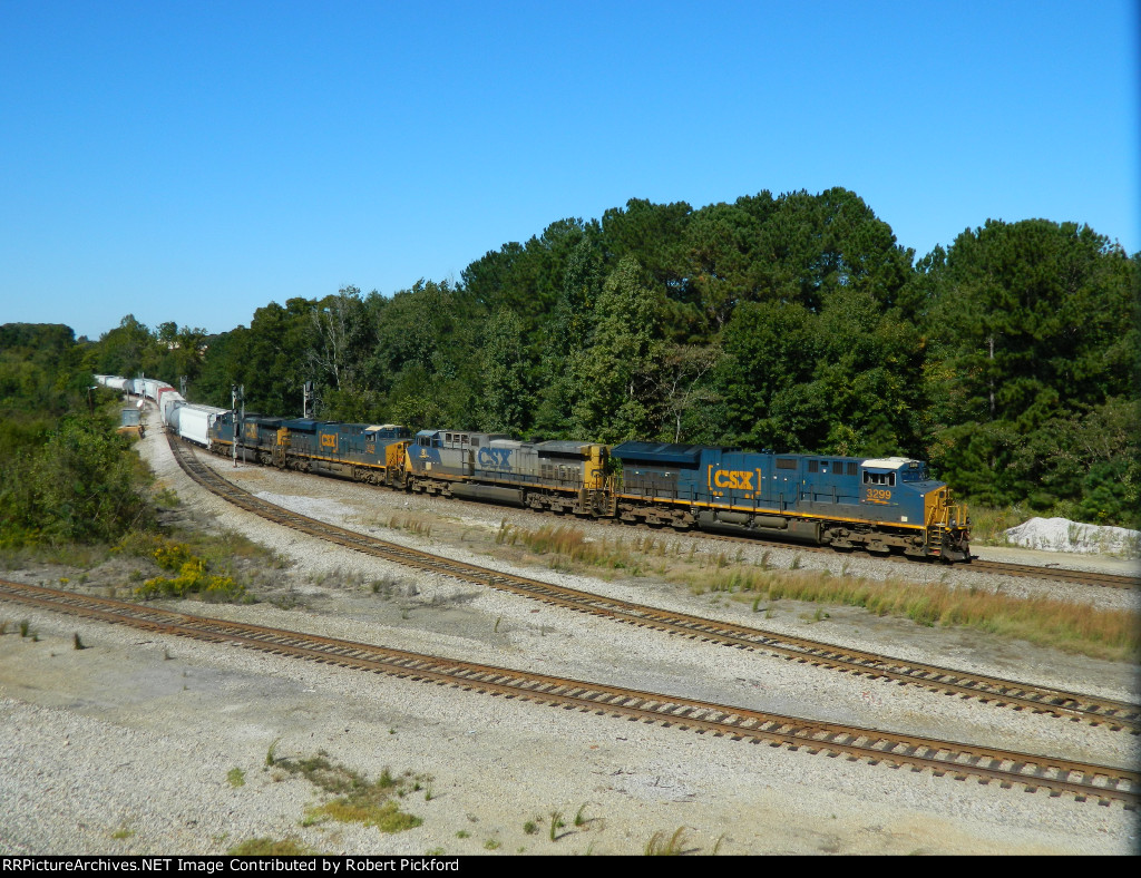 CSX 3299 (ET44AH) 81 (AC44CW) 3150 (ES44AC-H) 565 (AC44CW)